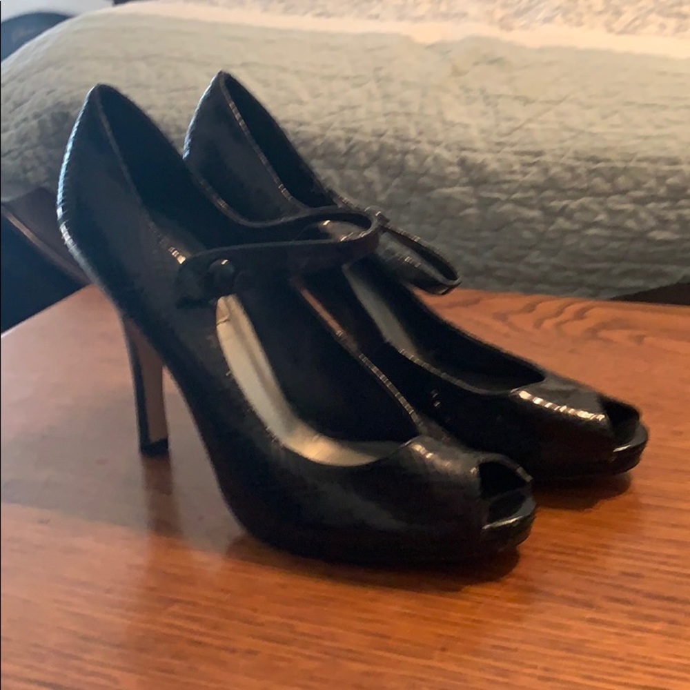 High Heeled peep toe shoes.